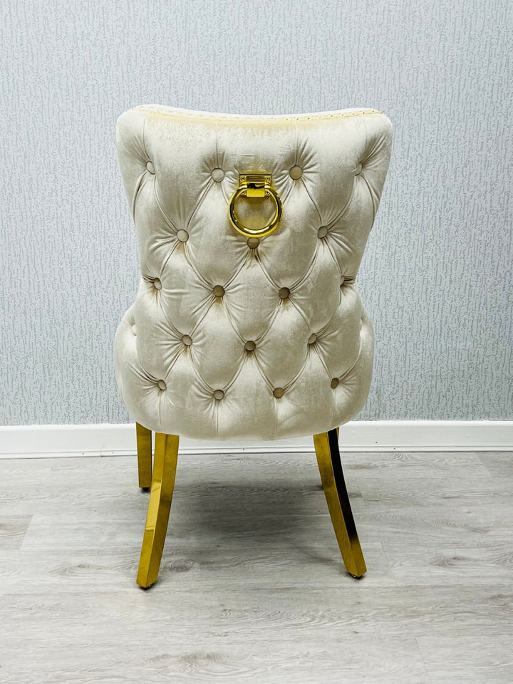 Arial Marble & Gold Dining Table With Victoria Quilted Ring Knocker Dining Chairs Gold Legs