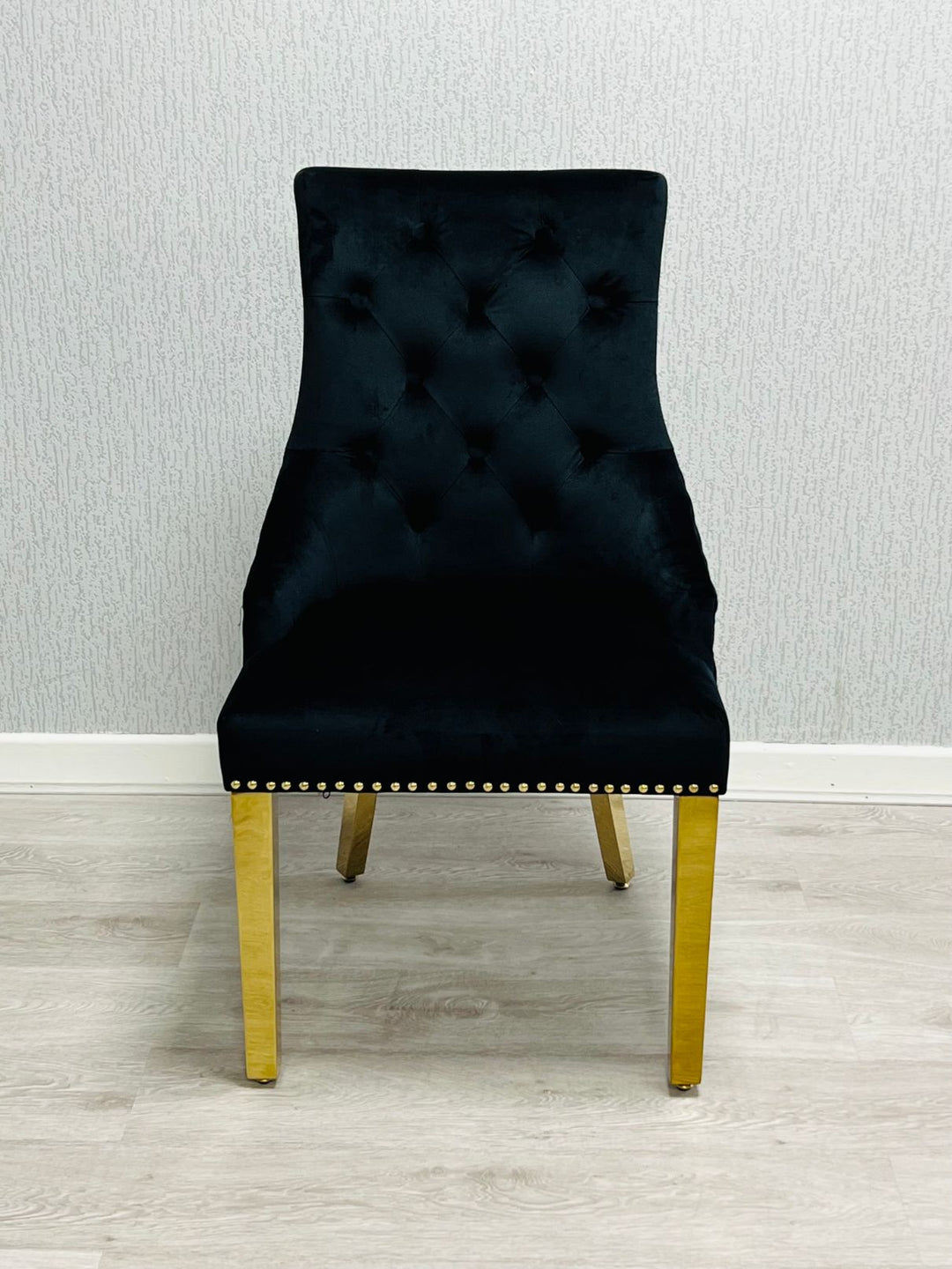 Louis Gold Black Marble Dining Table With Black/Gold Ring Quilted Knocker Dining Chairs